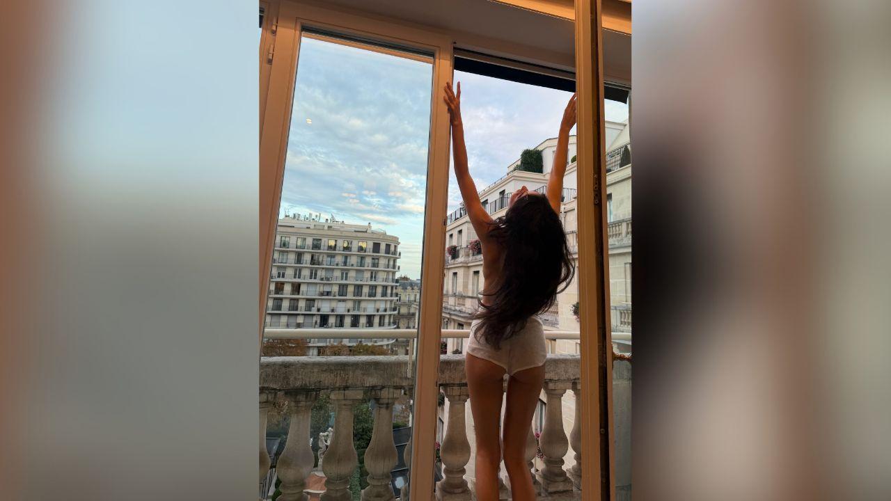 image of Sarah Jane Nader shared a daring photo from her Paris hotel room while enjoying a getaway.
