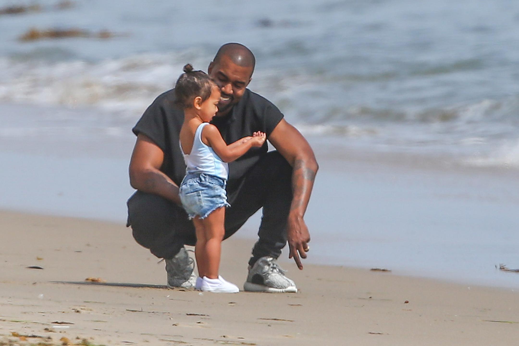 North Is Too Cute On The Beach With Kanye West And Kim Kardashian—See