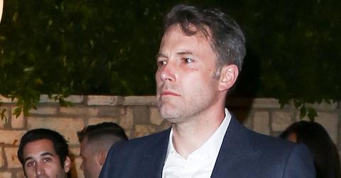 A somber looking Ben Affleck leaves a pre Oscar party