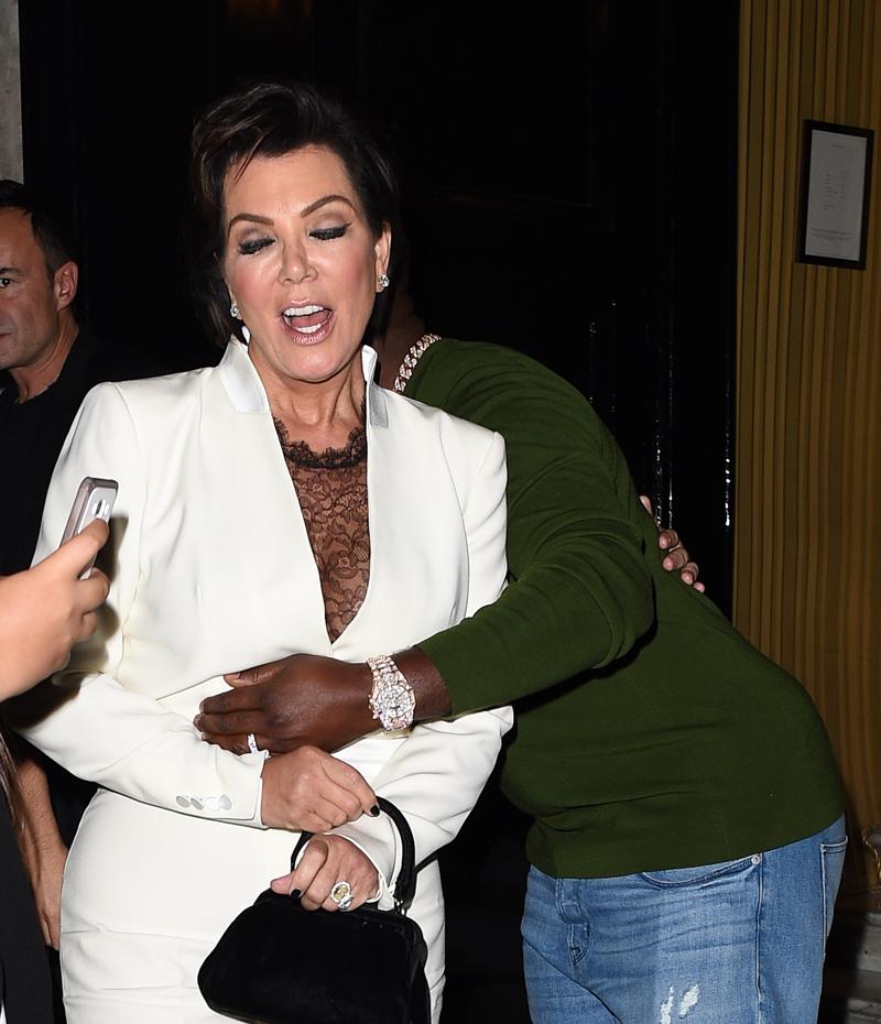 Kris Jenner looks worst for wear as she is helped to her waiting car by Corey Gamble after a 4 hour bender at the Costes Restuarnt in Paris.