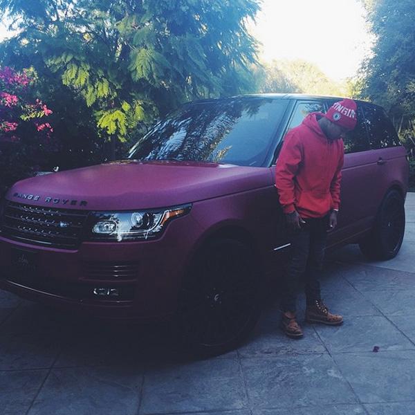 Tyga red range rover