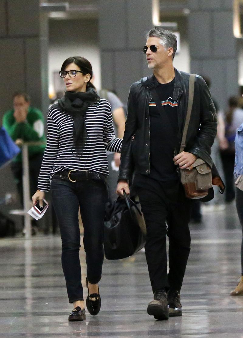 EXCLUSIVE: ** PREMIUM EXCLUSIVE RATES APPLY**  Sandra Bullock and boyfriend Bryan Randall looking very much in love as they get food at Austin airport before heading back to Los Angeles