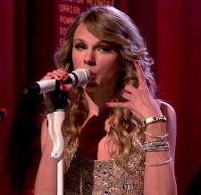 2009__11__wenn_taylor 225×218.jpg
