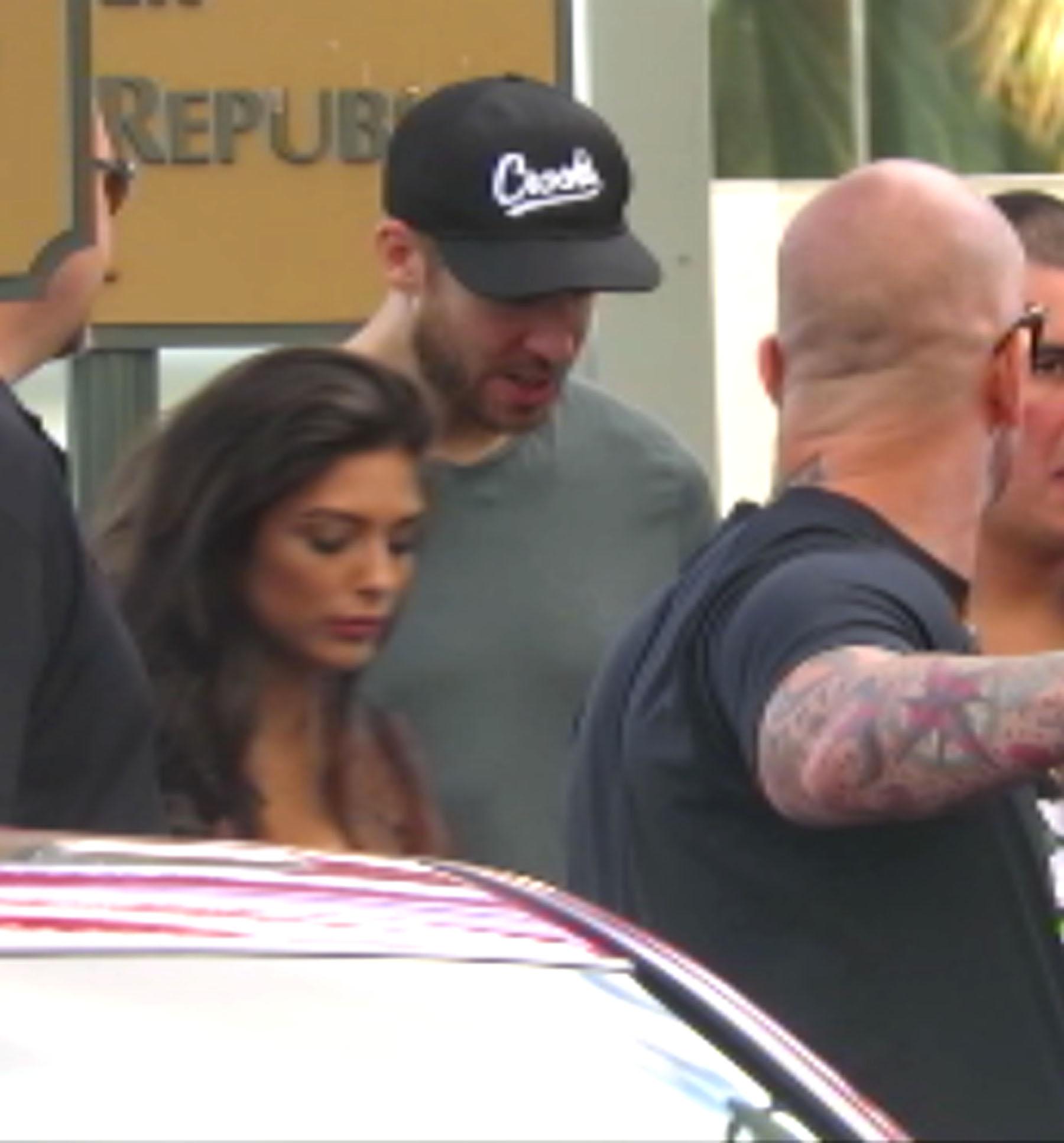 EXCLUSIVE: Calvin Harris leaves Wet Republic pool together with mystery woman who gets into his car before him in Las Vegas