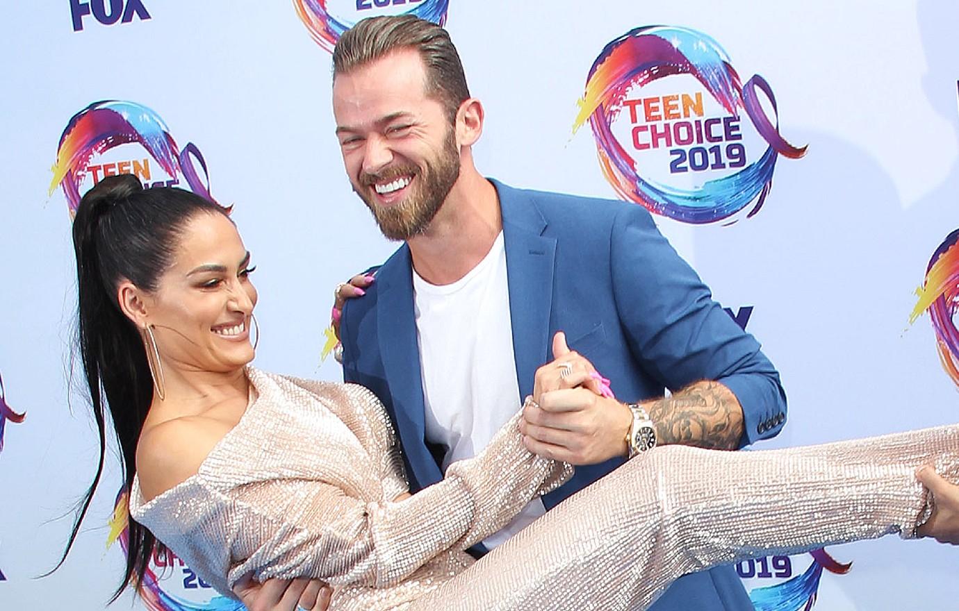 Nikki Bella & Artem Chigvintsev Officially Tie The Knot