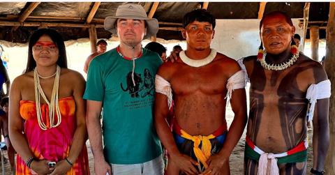 Image of DiCaprio with Indigenous leaders in Brazil.