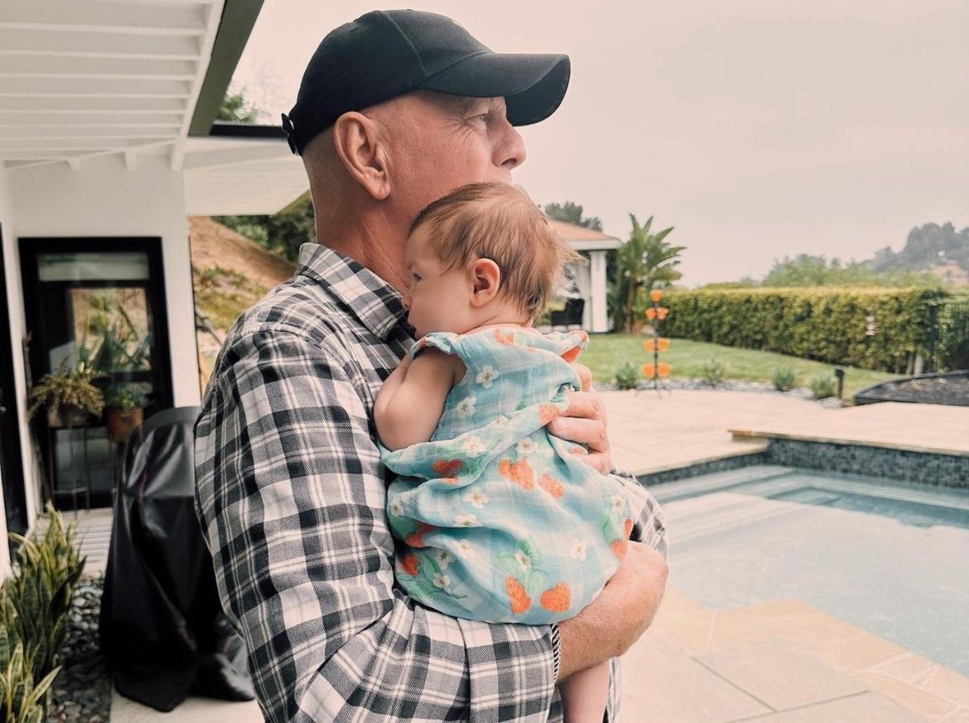 rumer bruce willis holding granddaughter treasure photos