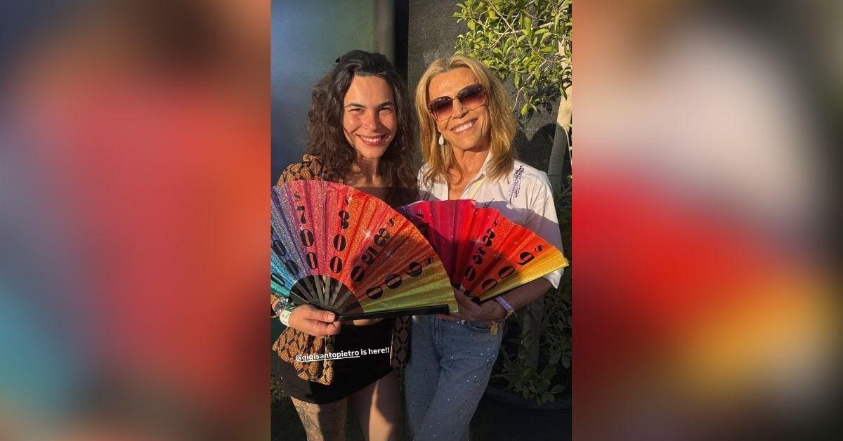 image of The TV hostess brought 'Wheel of Fortune'-themed fans during the event.