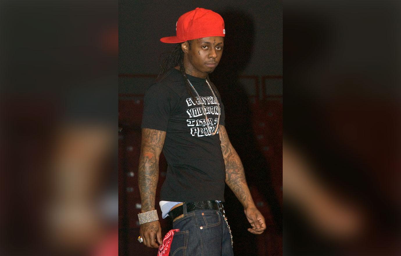 lil wayne offered ex cop uncle bob financial help saving rapper suicide attempt