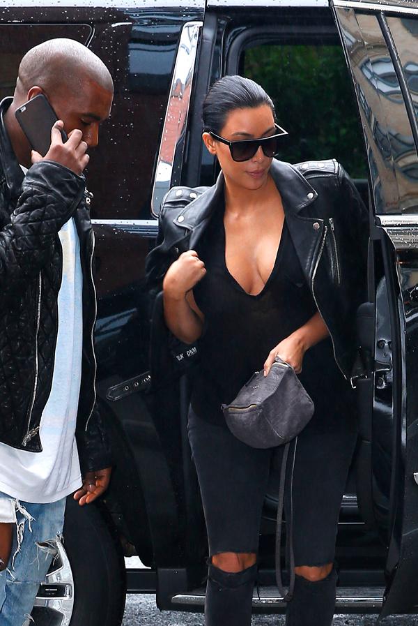 Kim Kardashian and Kanye West arrive back at their apartment in New York City