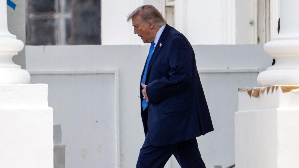 Image of Donald Trump debuted darker brown hair during a September 4 outing in Bedminster, N.J.