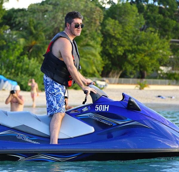 Simon cowell shirtless bathing suit wife kids barbados 05