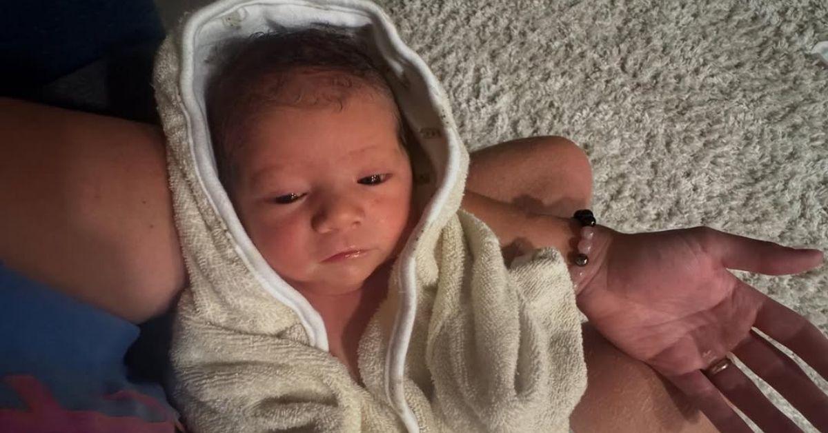 mormon wives zac affeck cradles newborn daughter photos one week after birth