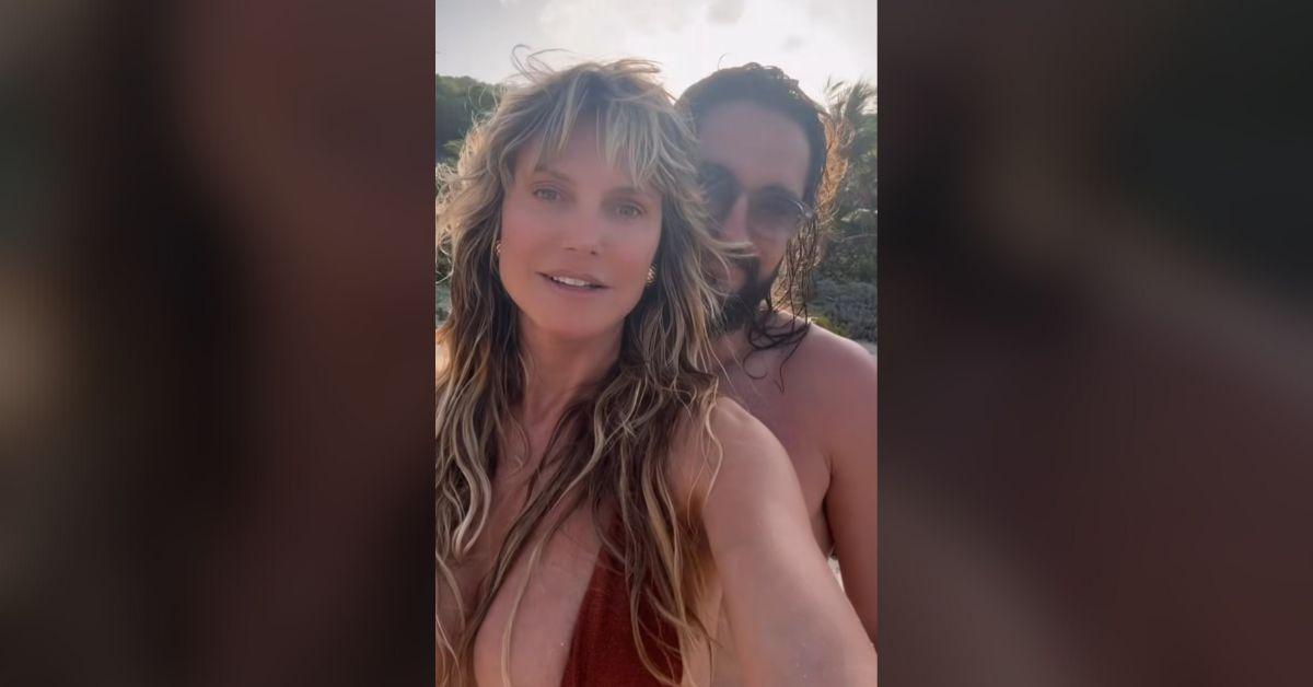 heidi klum bares cleavage racy video husband strokes body watch