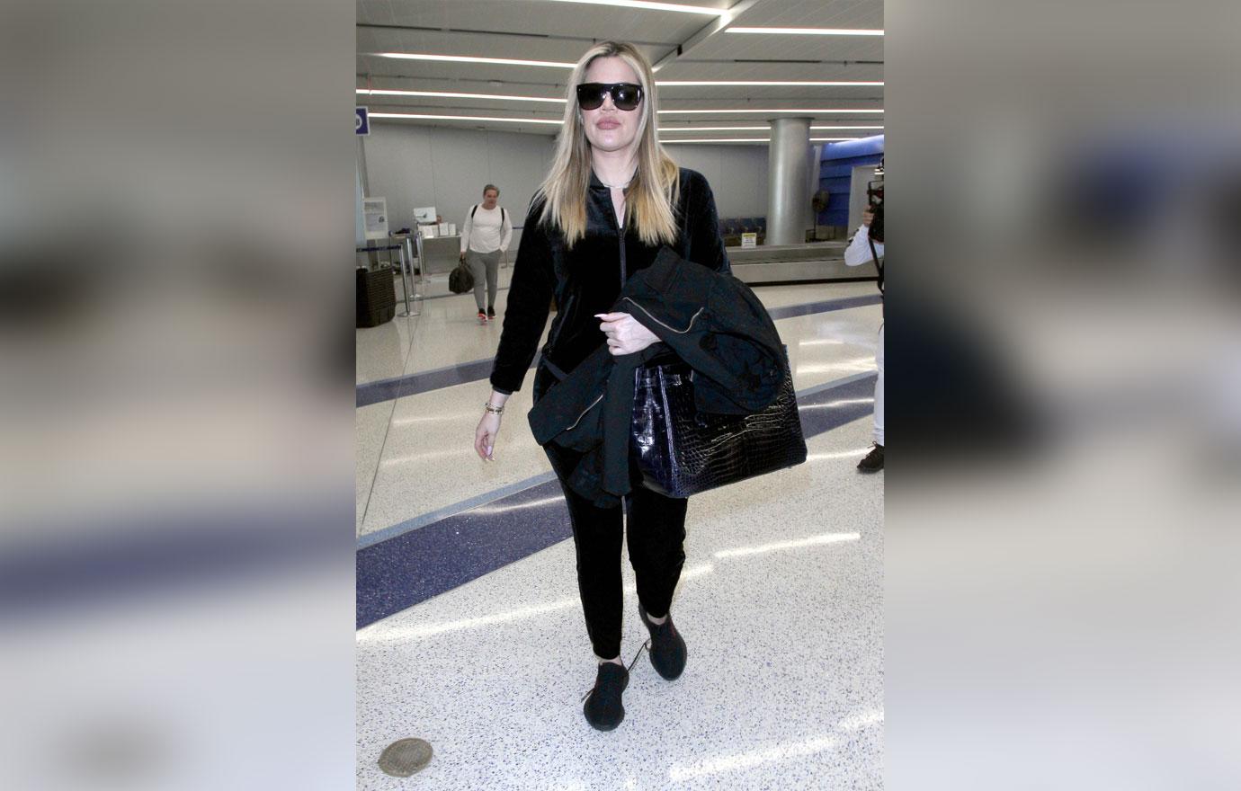 Khloe Kardashian Arriving at LAX Airport in an Adidas Tracksuit