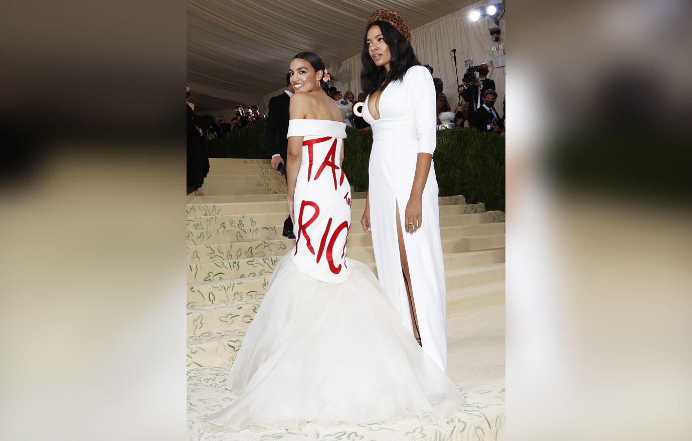 alexandria ocasio cortez makes political statement rocks ironic tax the rich gown at met gala ok