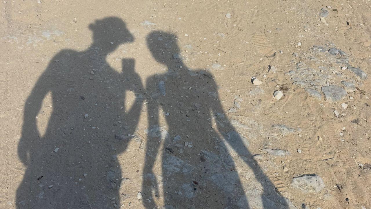 Image of Orlando Bloom appeared to tease his romantic life by sharing a photo of his shadow alongside a mystery woman's during the getaway.