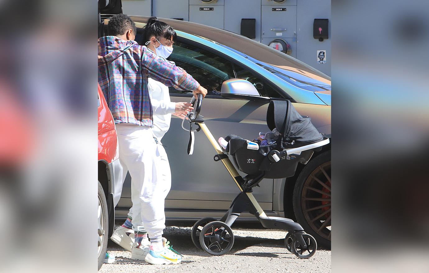 usher and girlfriend spotted with newborn baby