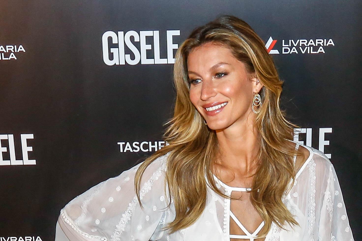 Gisele Bundchen in a white dress in Brazil