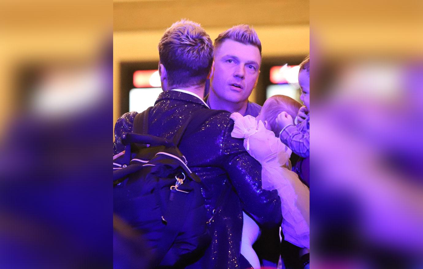 nick carter and sister angel try to embrace holiday at event with lance bass and his family