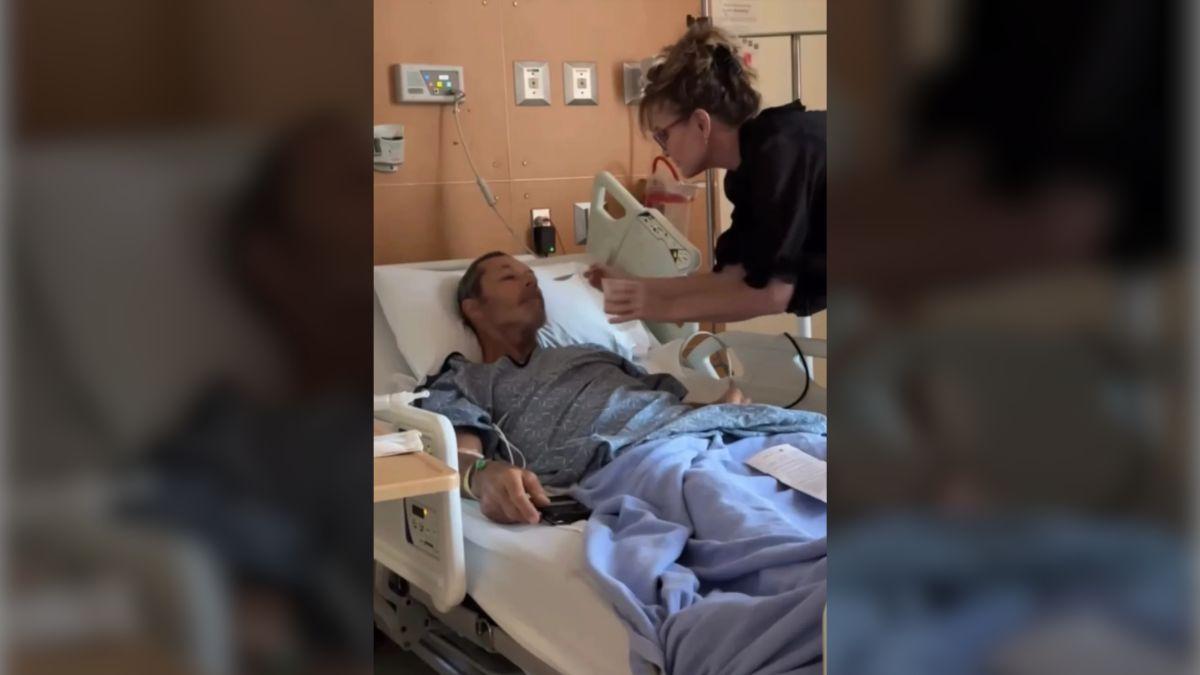 image of Sarah Palin gently fed Ron Duguay as he rested in a hospital bed.