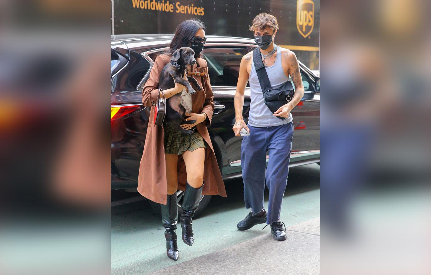 dua lipa and anwar hadid seen with their dog as arriving back at their hotel in nyc