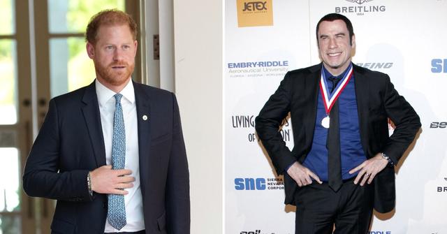 prince harry accused wearing heels towers over john travolta photo
