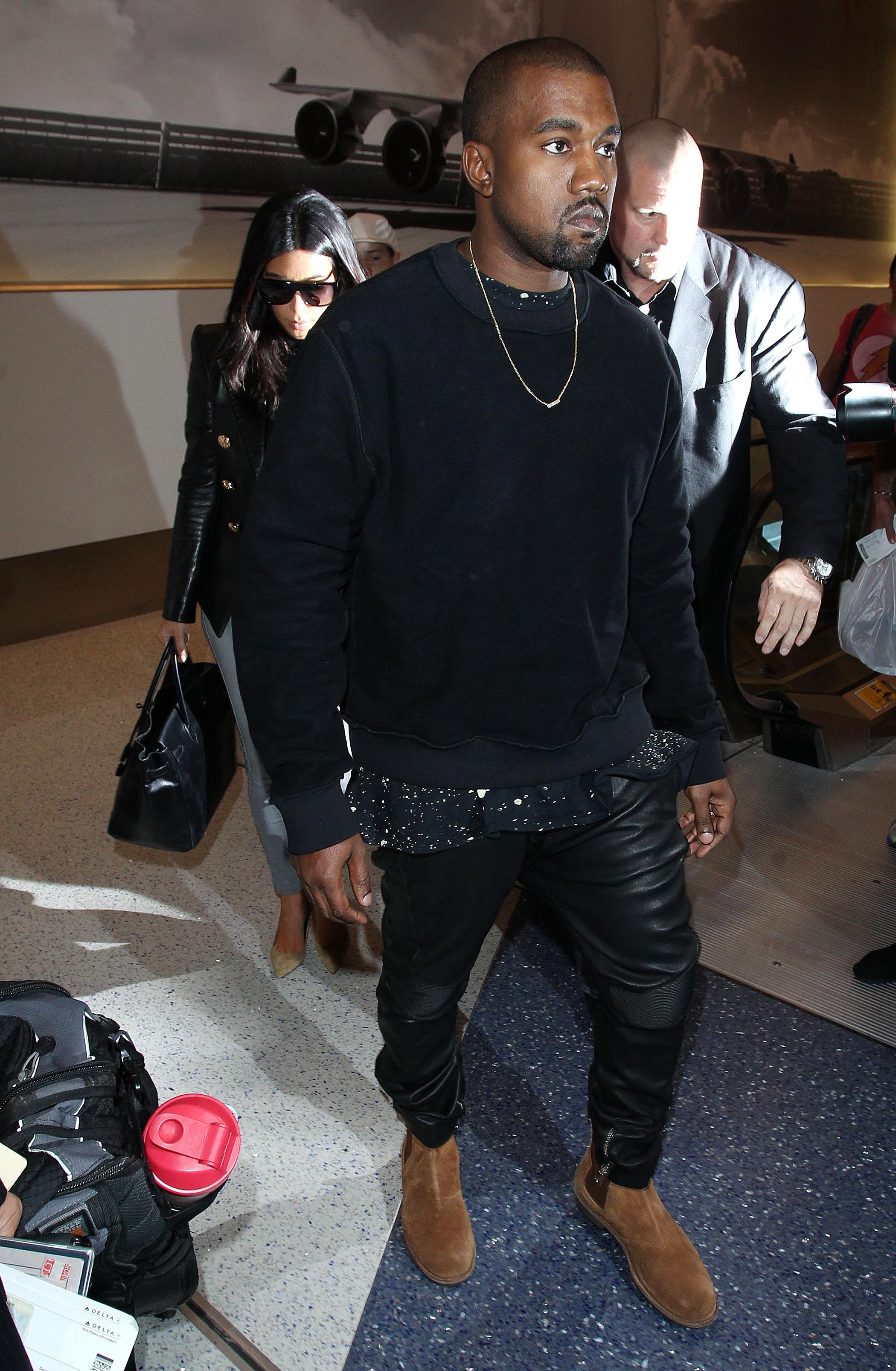 Kim Kardashian and Kanye West spotted arriving at the Los Angeles International Airport ***NO DAILY MAIL SALES***