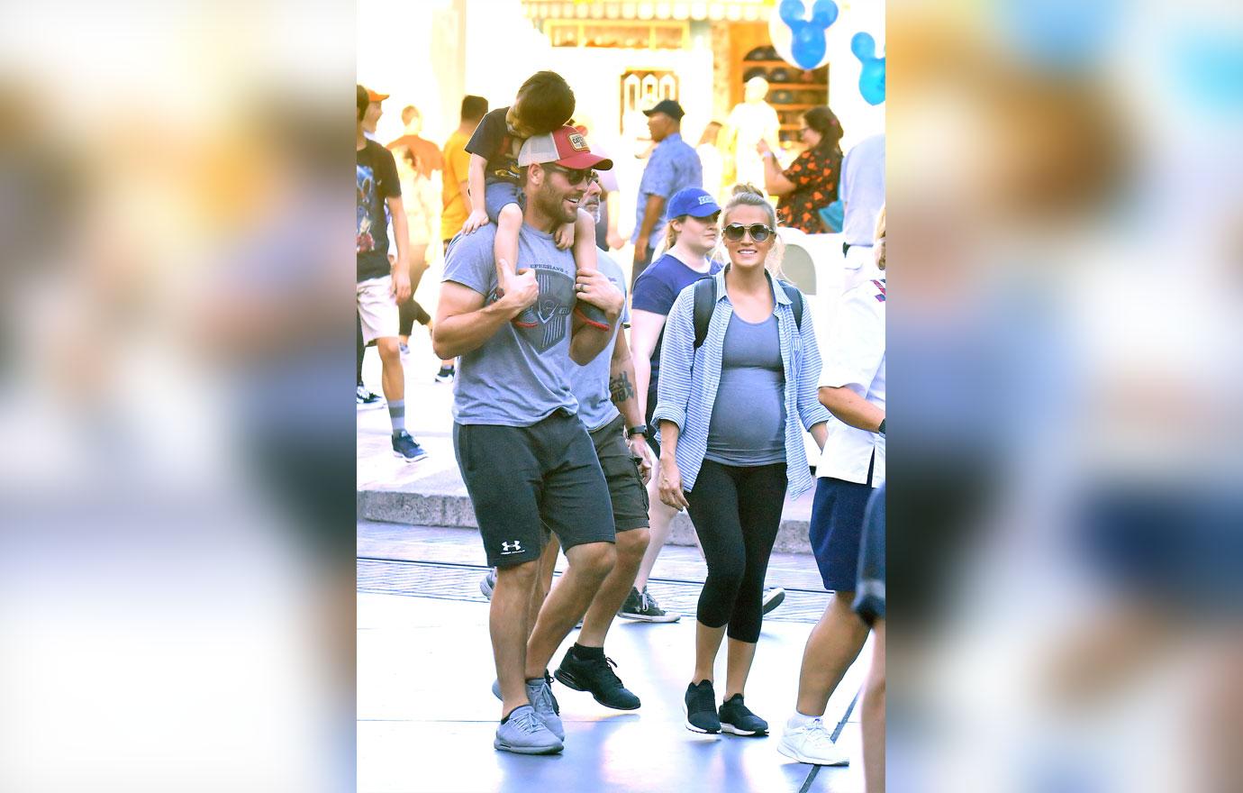 PICS Carrie Underwood Displays Her Massive Baby Bump At Disneyland!