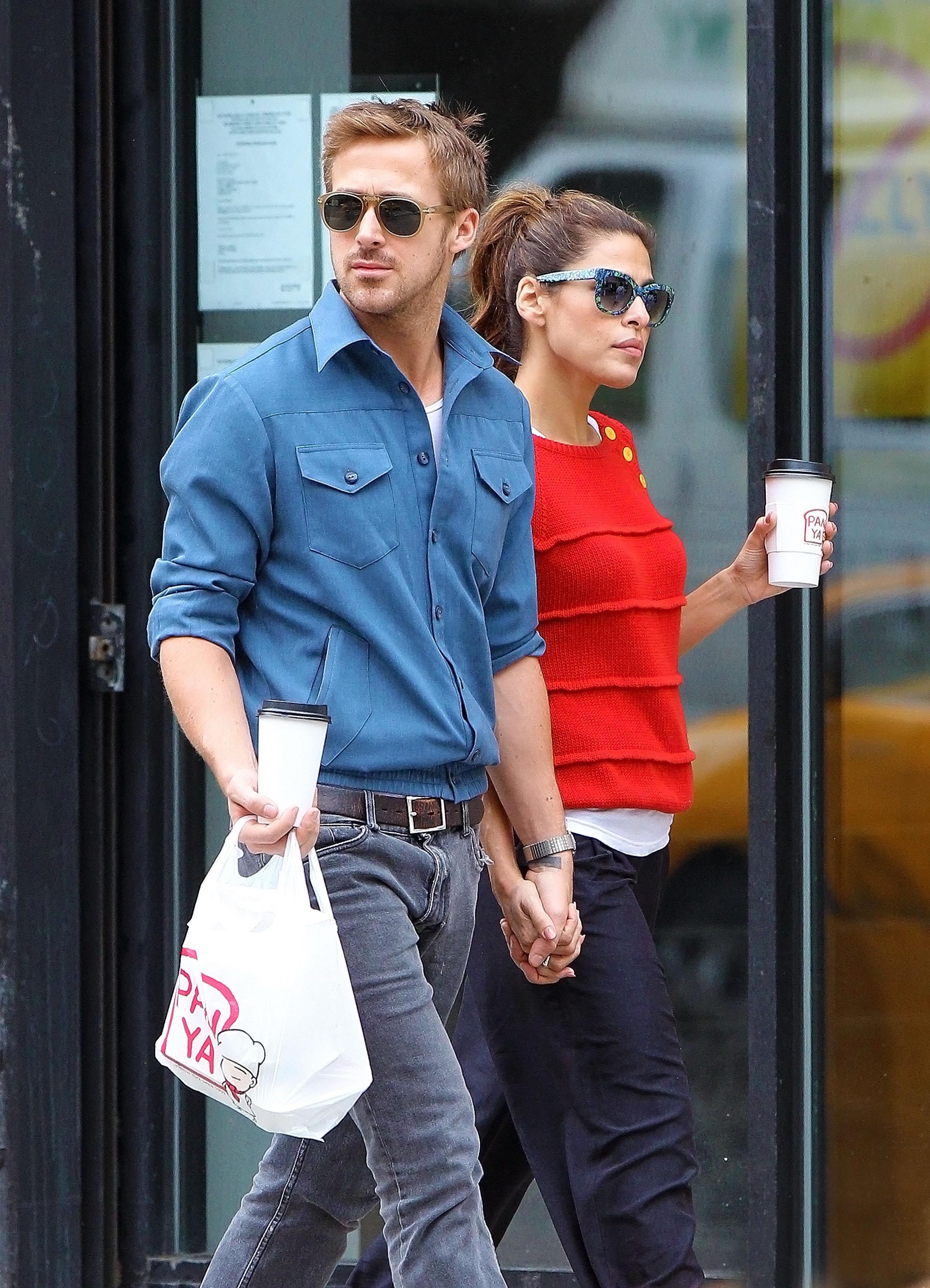 Ryan Gosling and Eva Mendes hold hands on a romantic walk in NYC