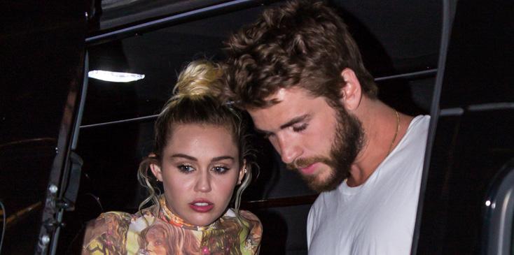 Miley Cyrus Seen Holding Tight Onto Liam Hemsworth When Arriving At Their Manhattan Hotel In NYC