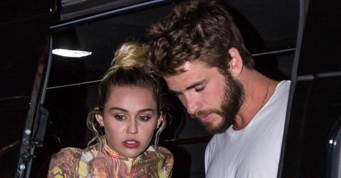 Miley Cyrus Seen Holding Tight Onto Liam Hemsworth When Arriving At Their Manhattan Hotel In NYC