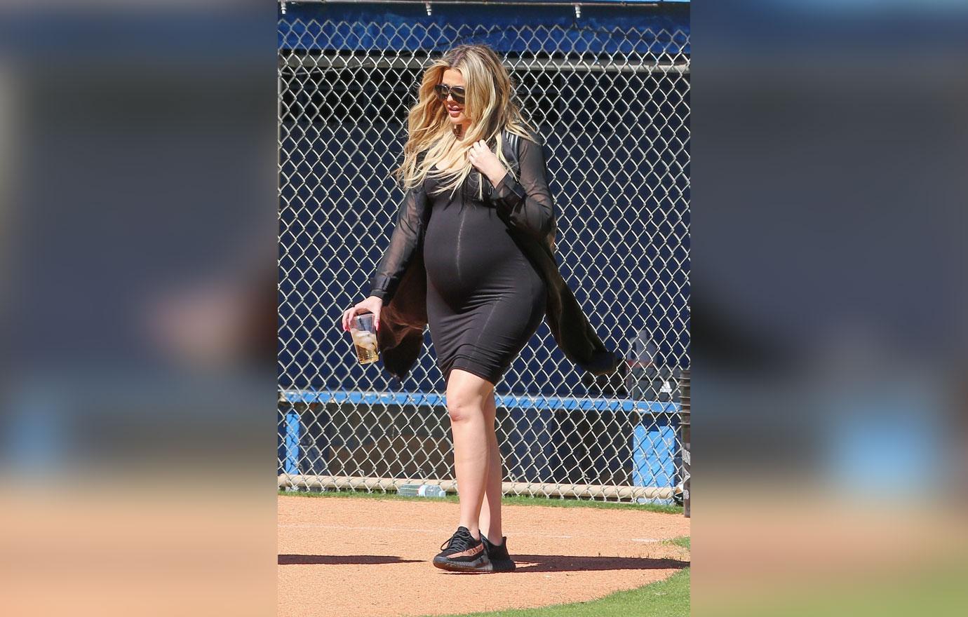 Pregnant Khloe Kardashian Flaunts Baby Bump During Family Softball Game