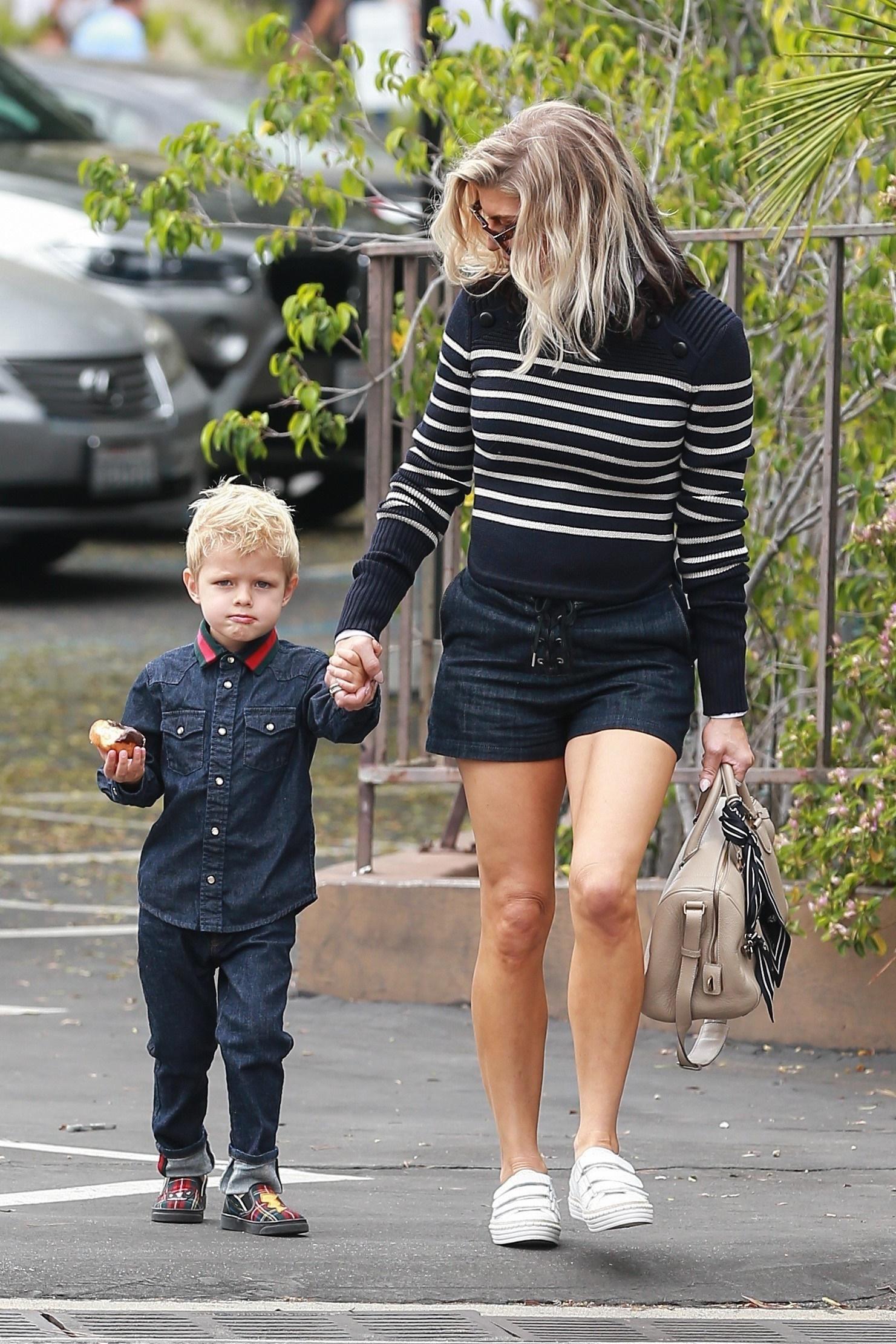 Fergie and Axl coordinate their looks for church