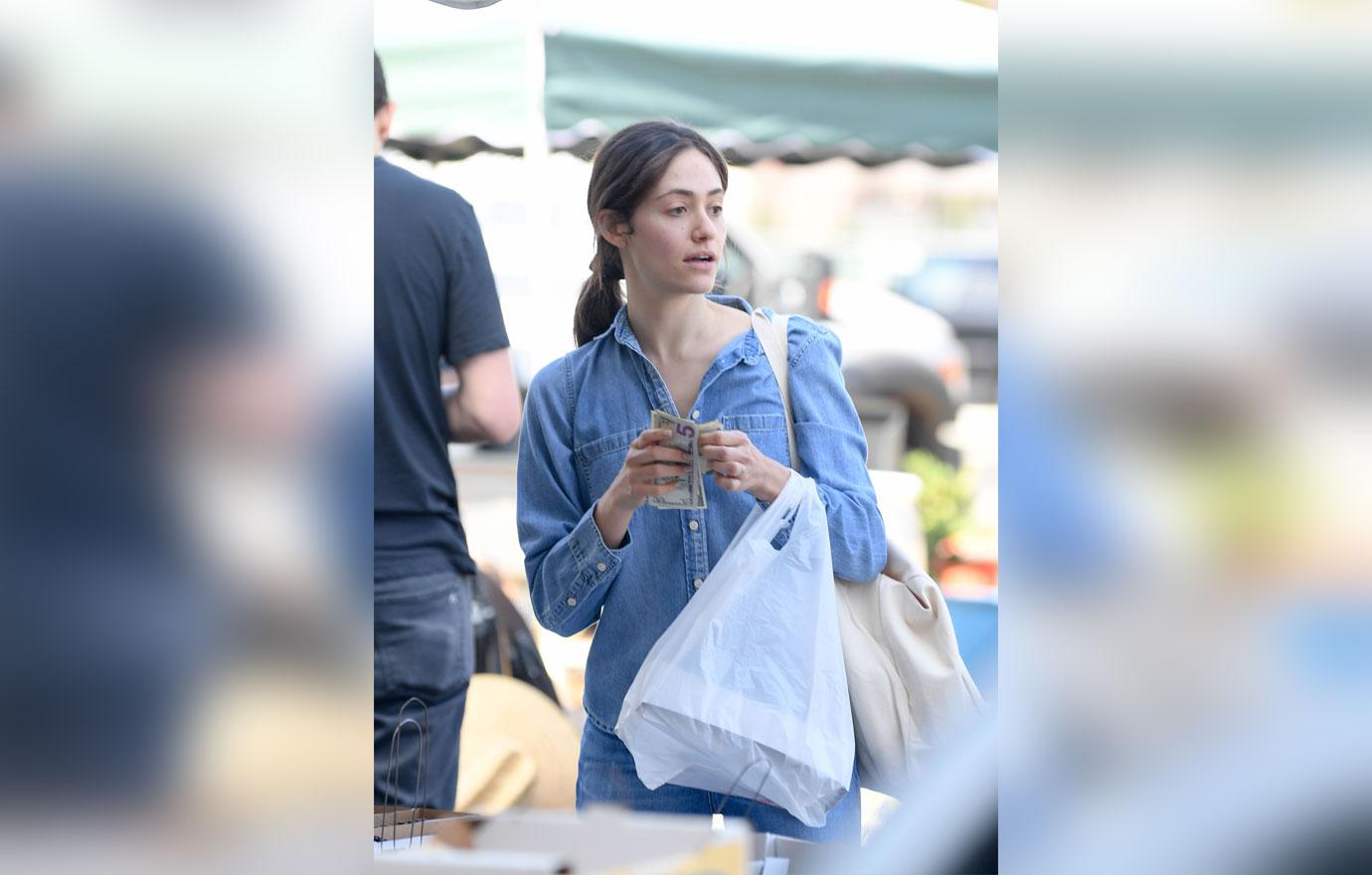 EXCLUSIVE: Emmy Rossum and husband Sam Esmail pick up produce at their local farmer&#8217;s market