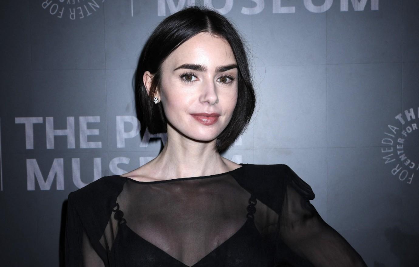 lily collins reveals favorite phil collins song too many