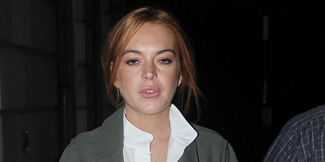 INF &#8211; Lindsay Lohan Wears A Long Coat Over A White Dress &amp; Knee High Boots