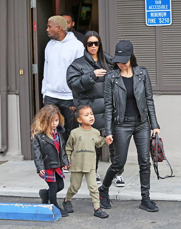 Kardashian sisters Kim and Kourtney join Kanye West and the kids for dinner