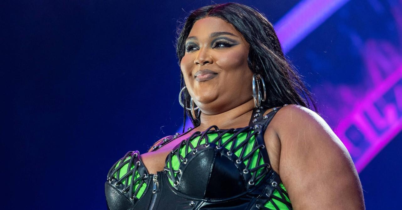 lizzo flaunts slim figure tight dress dramatic weight loss