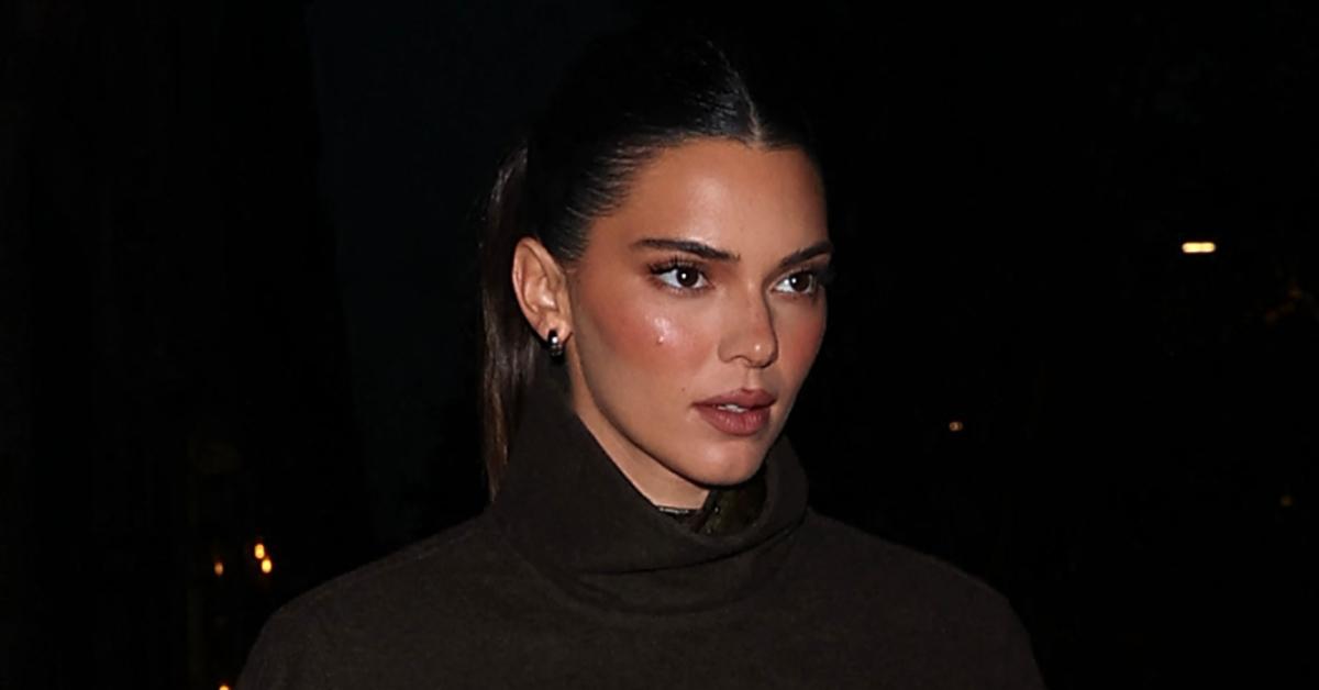 Kendall Jenner goes topless with just a teeny black bra for new sexy snaps  amid rumors model 'got a boob job