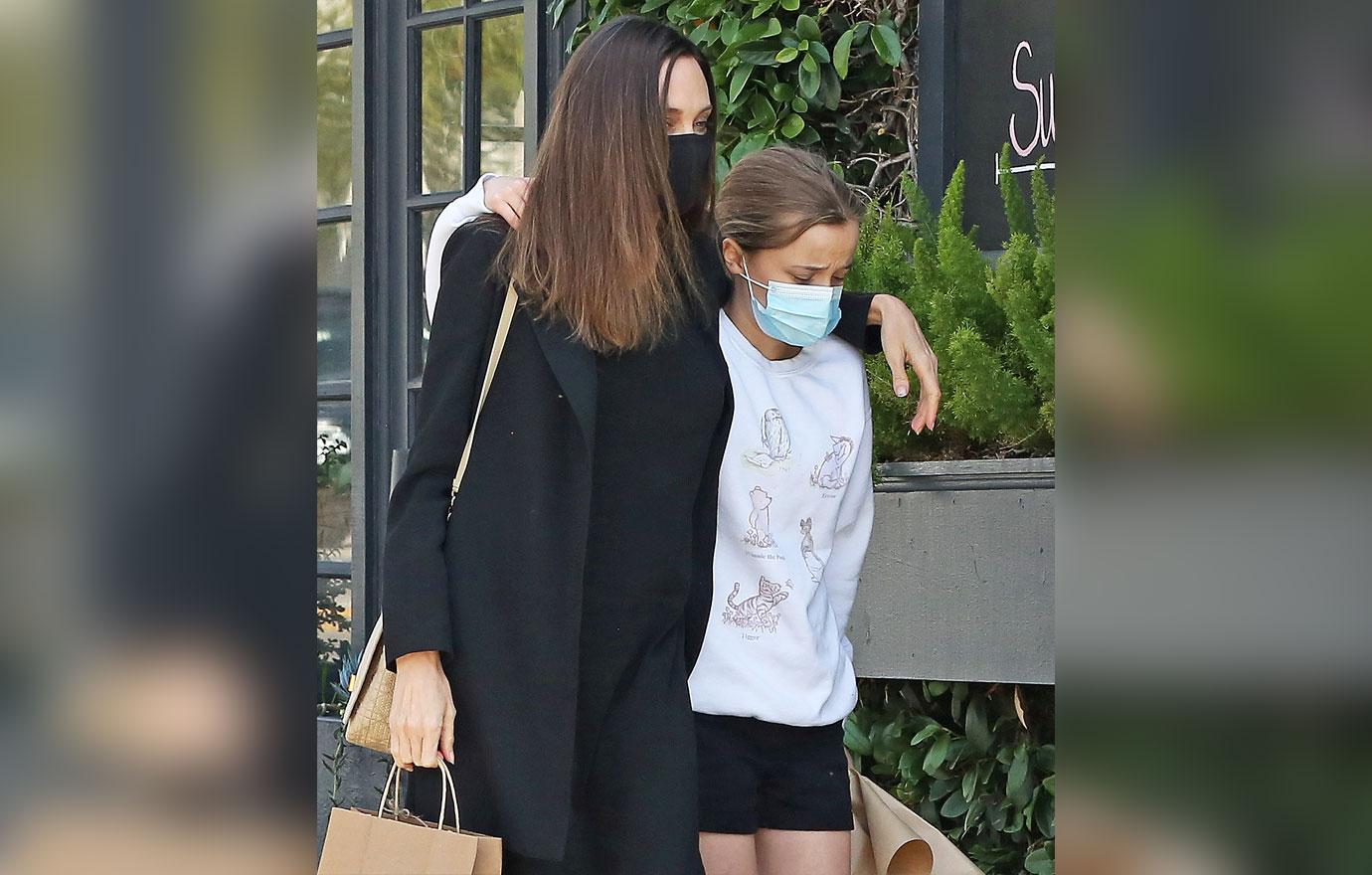 angelina jolie seen out with vivienne buying flowers