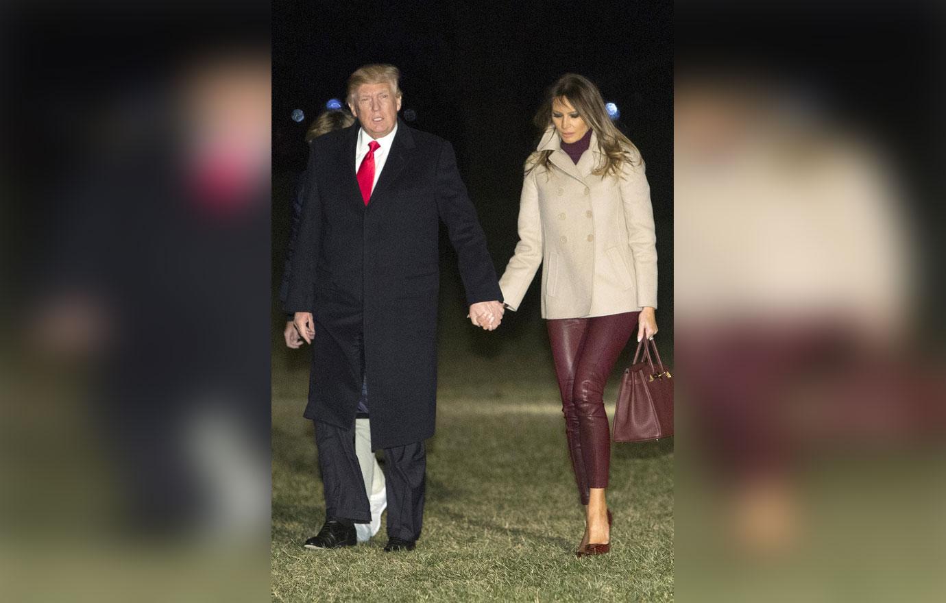 President Donald Trump returns from Florida with Melania and son Barron