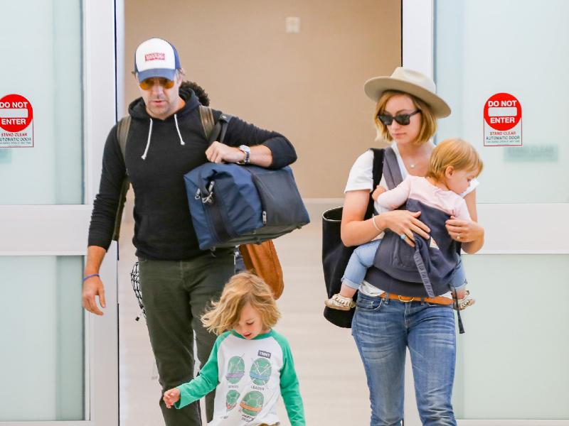 Jason Sudeikis and Olivia Wilde with their children in LAX