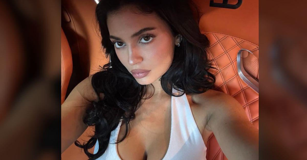 Image of Kylie Jenner popped out of a tight white tank.