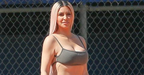 Kim kardashian plays softball in bra pics