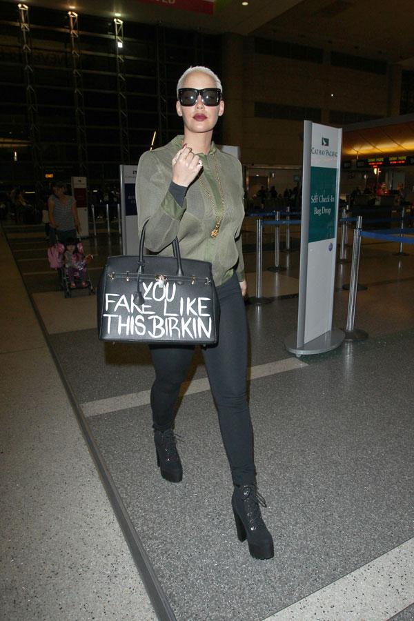 Is Amber Rose Dissing Kylie Jenner With Her 'Fake Like This Birkin' Bag?