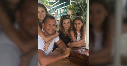 Photo of Alex Rodriguez, Cynthia Scurtis, and their daughters Natasha and Ella.