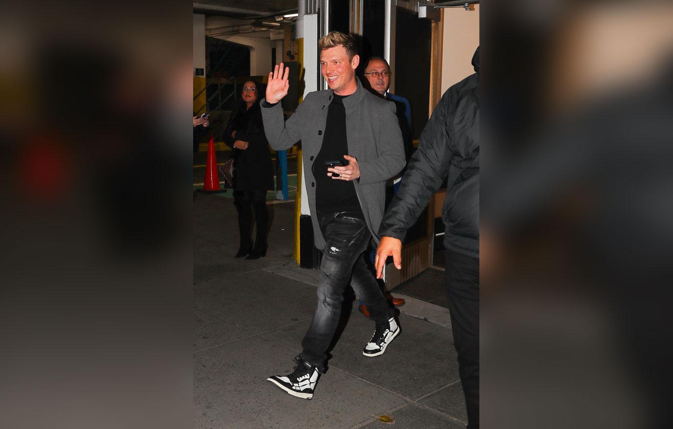 nick carter big smile denying sexual assault allegations