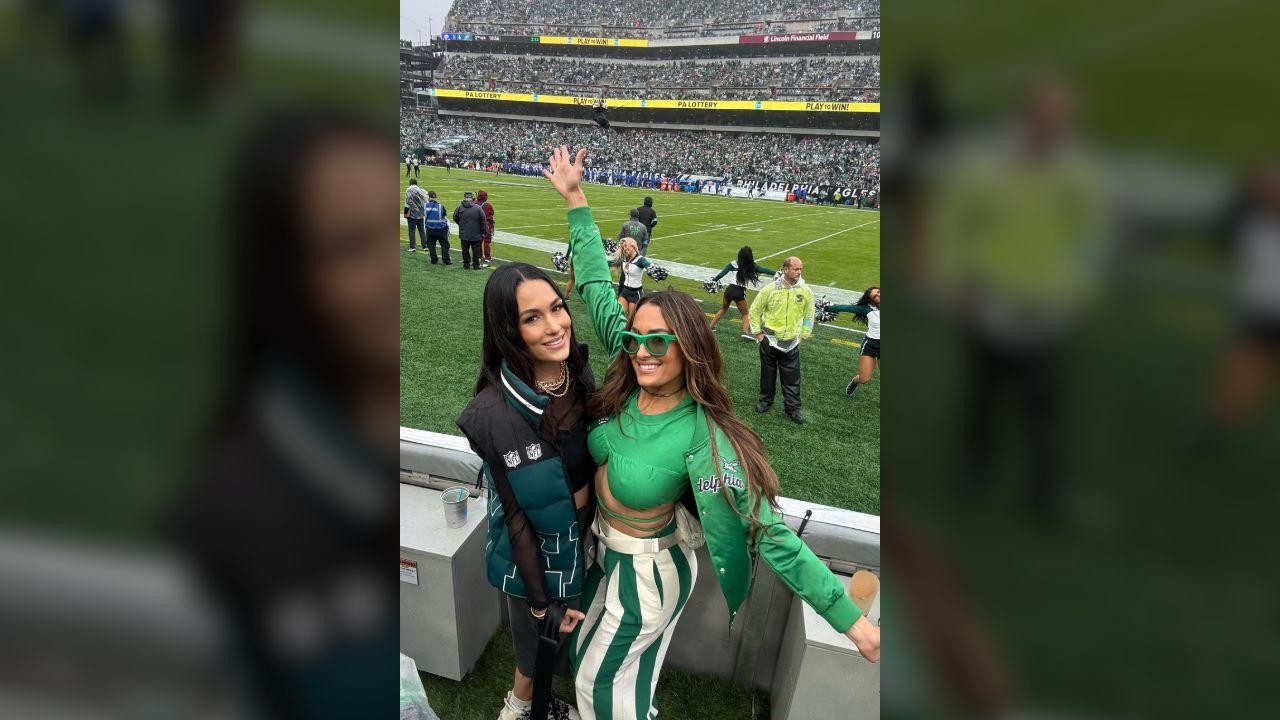 Photo of Nikki and Brie posed at the game.
