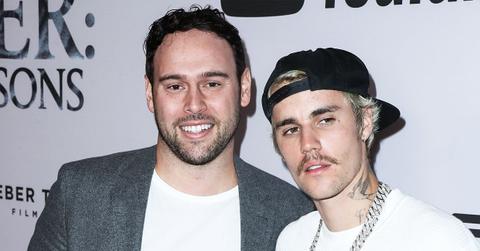 justin bieber fans slam scooter braun